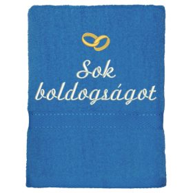Acélkék hímzett „Sok boldogságot” feliratú törölköző arany gyűrűkkel, esküvői ajándék