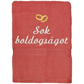 Lazac színű hímzett „Sok boldogságot” feliratú törölköző arany gyűrűkkel, esküvői ajándék