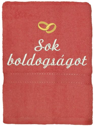 Lazac színű hímzett „Sok boldogságot” feliratú törölköző arany gyűrűkkel, esküvői ajándék